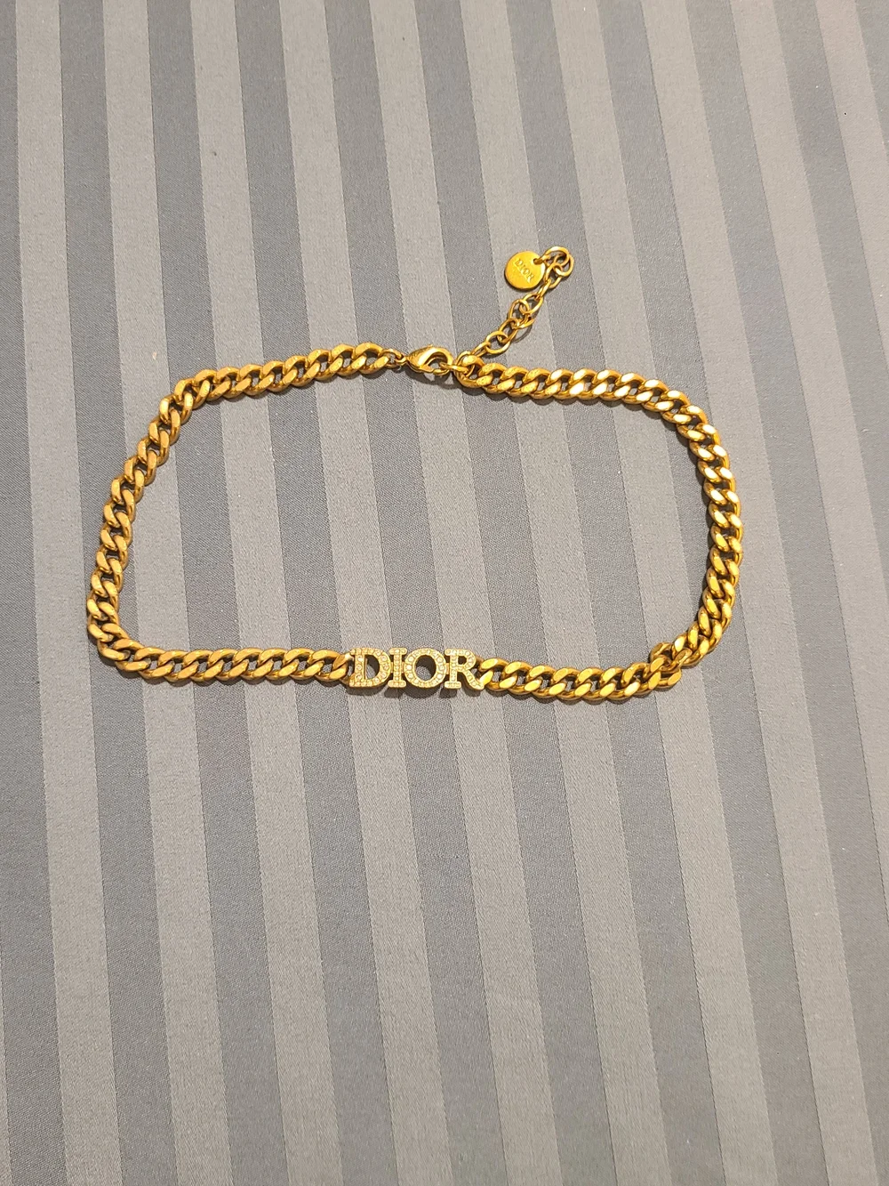 Dior signature logo